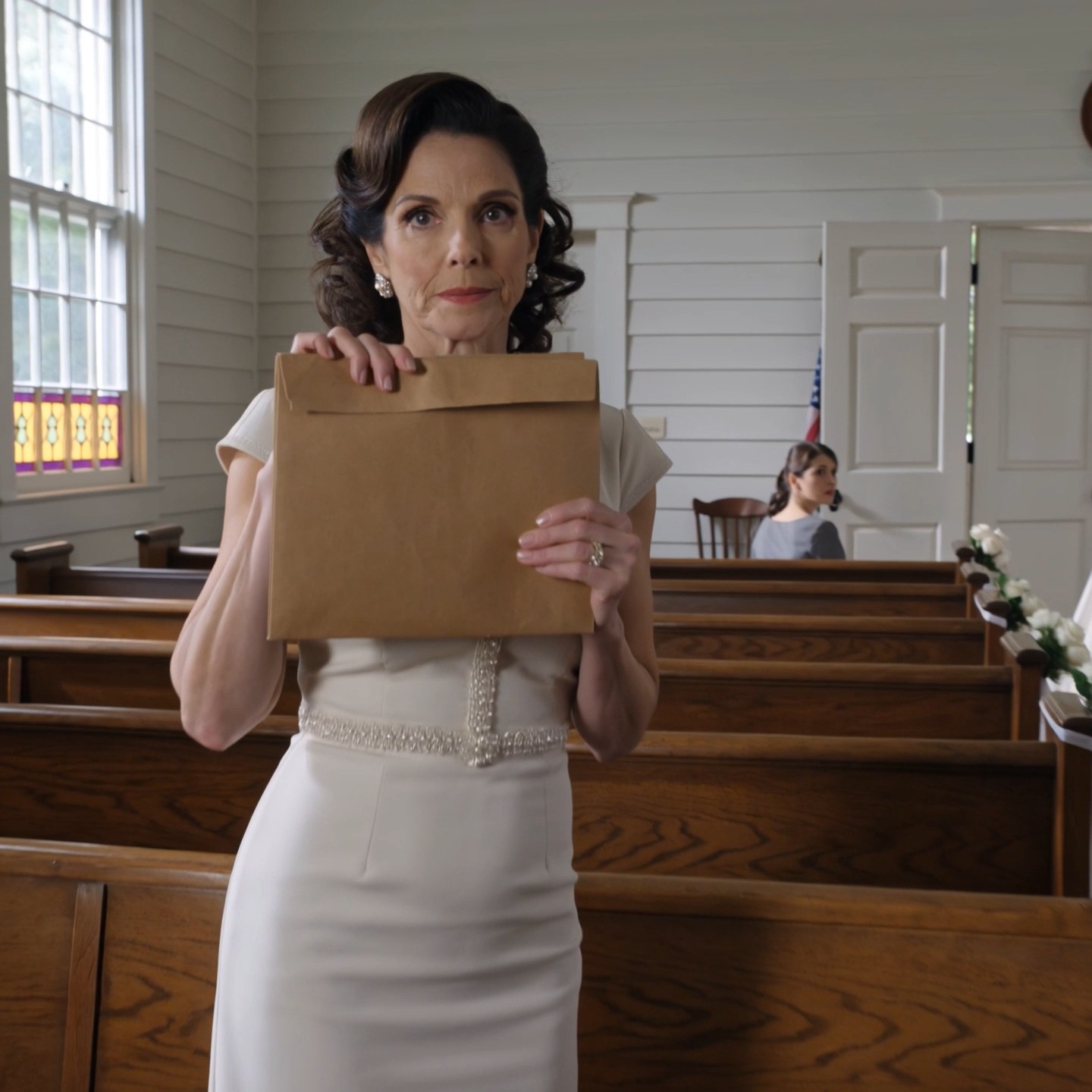 At seven on the morning of my daughter’s wedding, my neighbor pulled into my driveway, told me to get in her Buick and keep quiet, and drove me across town to a small cream-colored house that explained, in less than three minutes, why the man waiting at our church had chosen Clare in the first place.