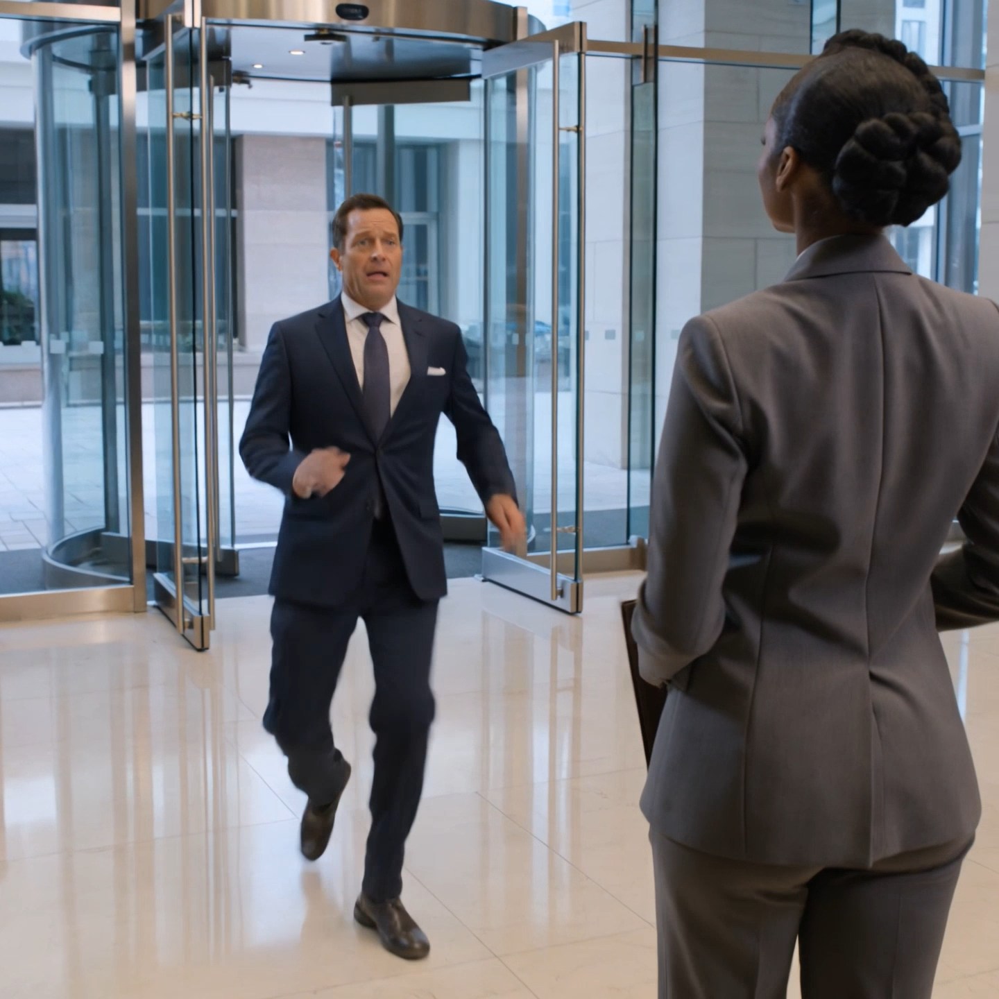 For twelve quiet minutes, a downtown bank treated a Black woman in a gray blazer like she was in the wrong building. Then the regional manager walked through the front doors, saw where his staff had seated her, and forgot the first line of his welcome.