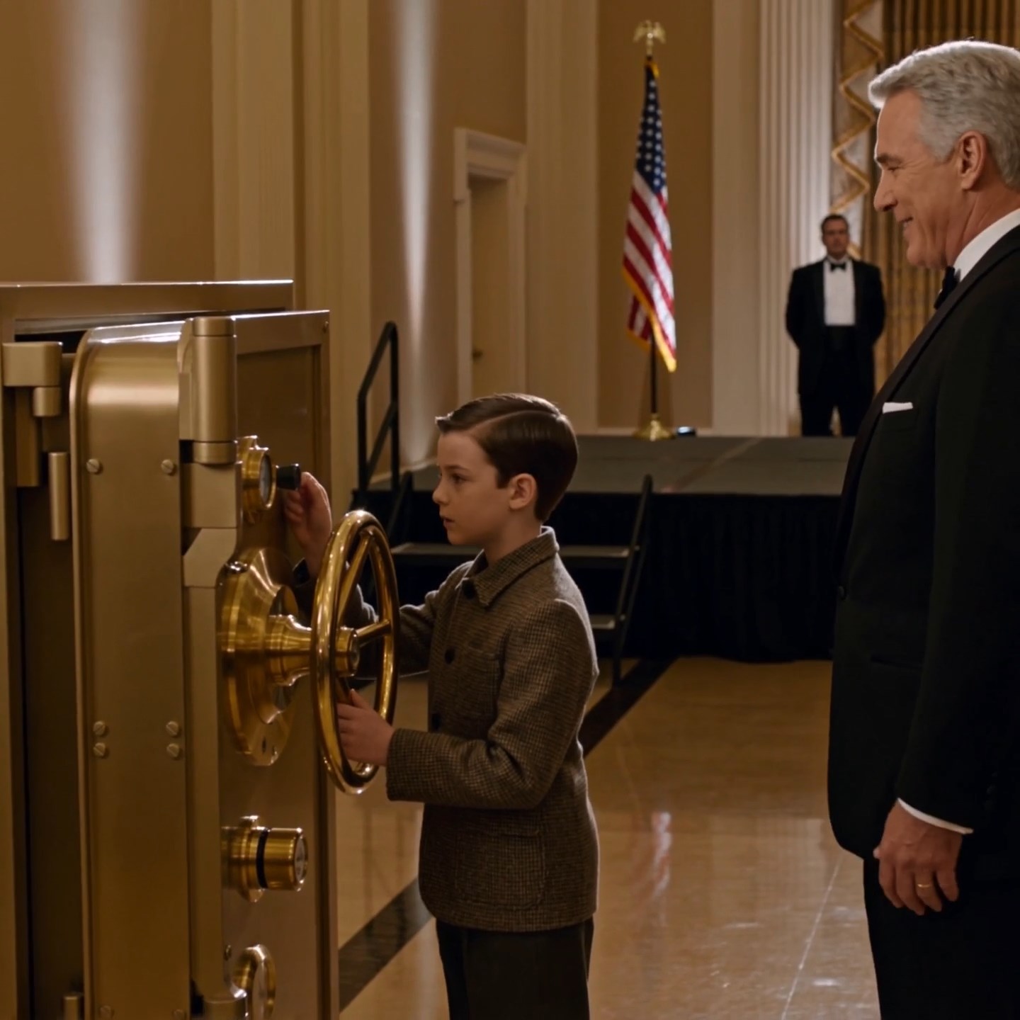 He offered an eight-year-old boy $10,000 to open the gold safe so the whole ballroom could laugh—then the first click hit, and the richest man in the room went pale.