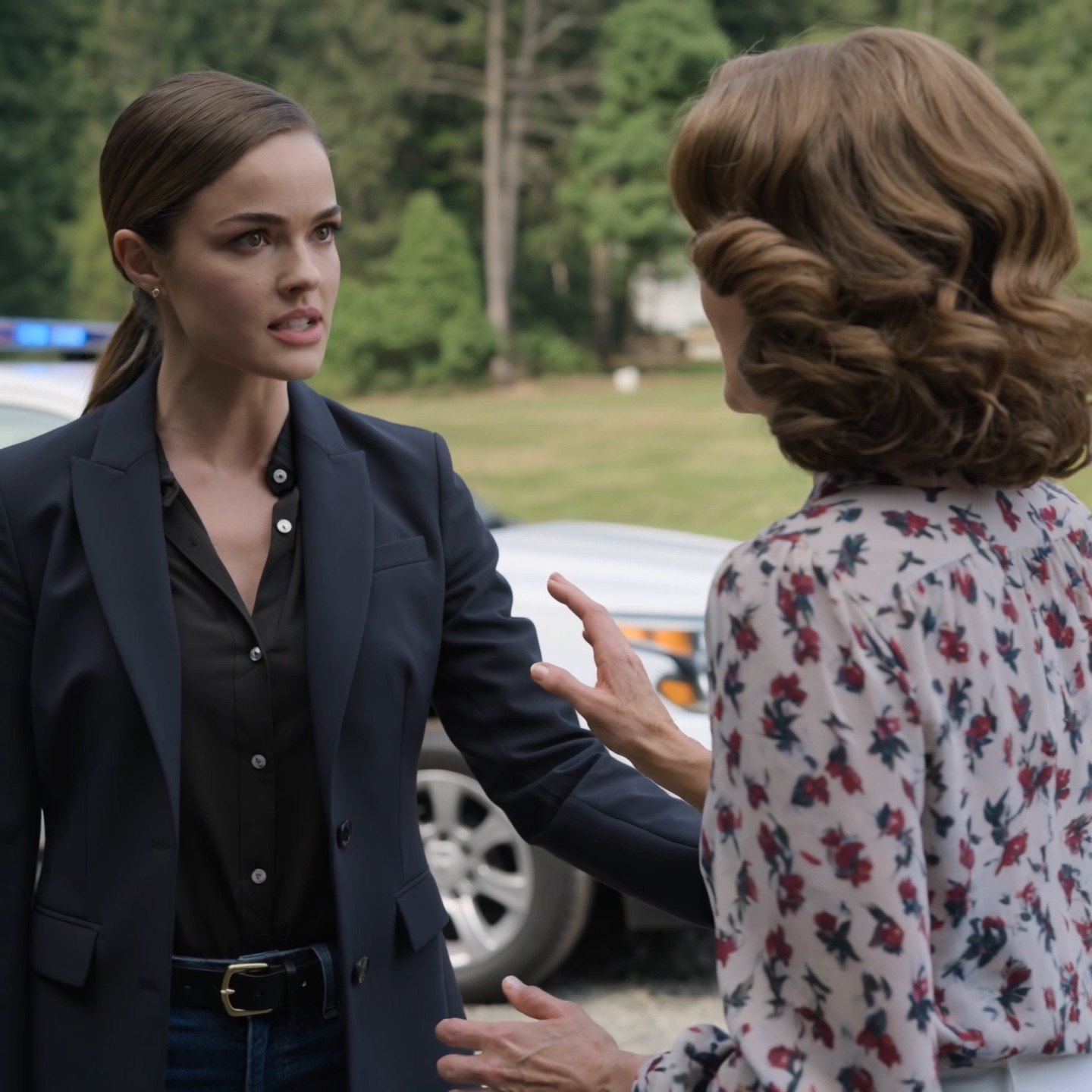 My parents gave their house to my sister as a wedding gift after I had spent five years paying the mortgage. Two months later, they sat across from me at Sunday dinner and told me they’d be moving into my lake house by next weekend. I said one word: No. Three days later, I turned onto the gravel drive and saw blue lights flashing through the trees, my parents’ SUV parked on the grass, and a deputy holding something in his hand that finally changed my mother’s face.